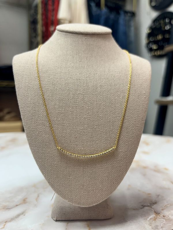 Gold pave curve necklace