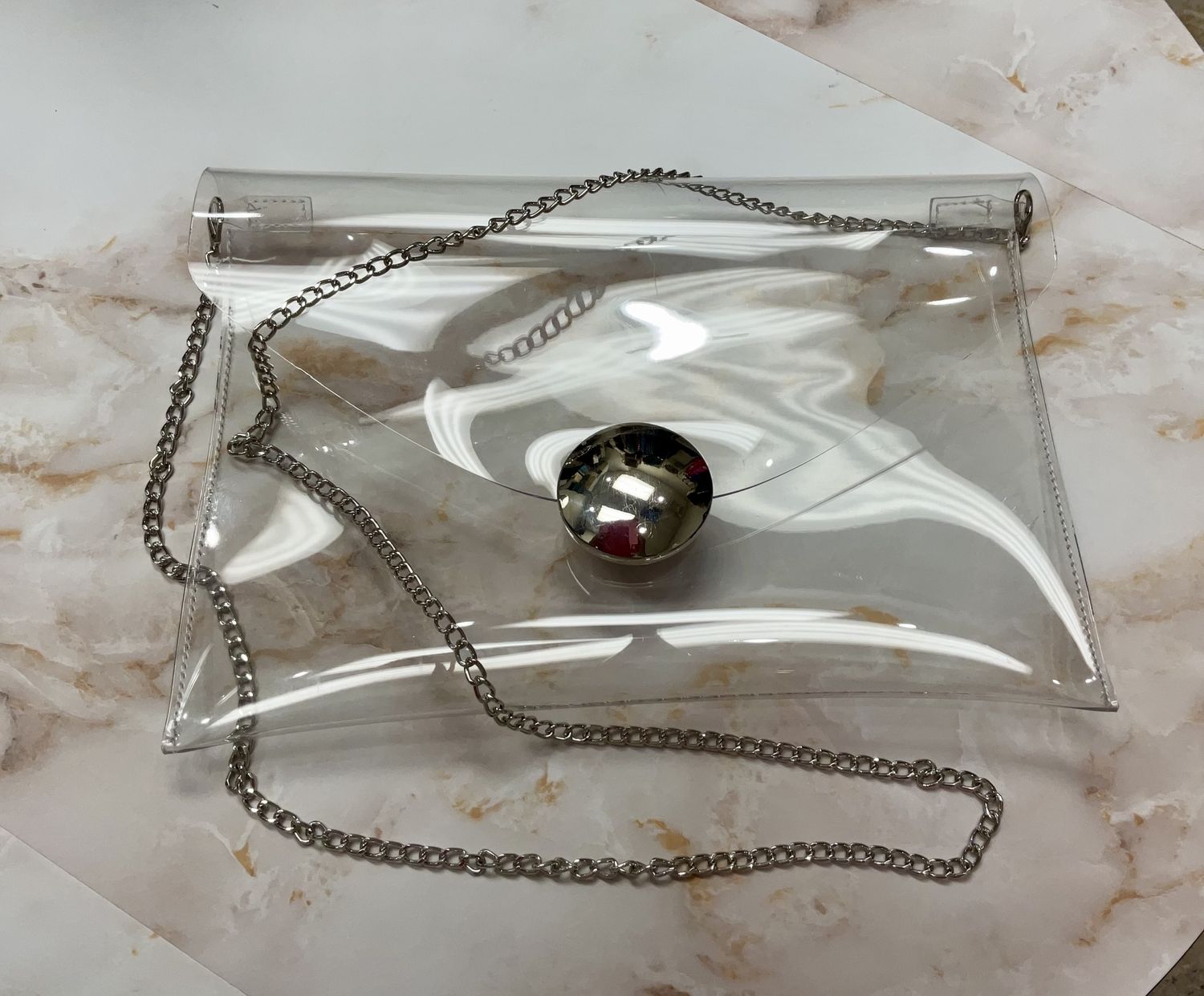 Clear bag with  metal straps