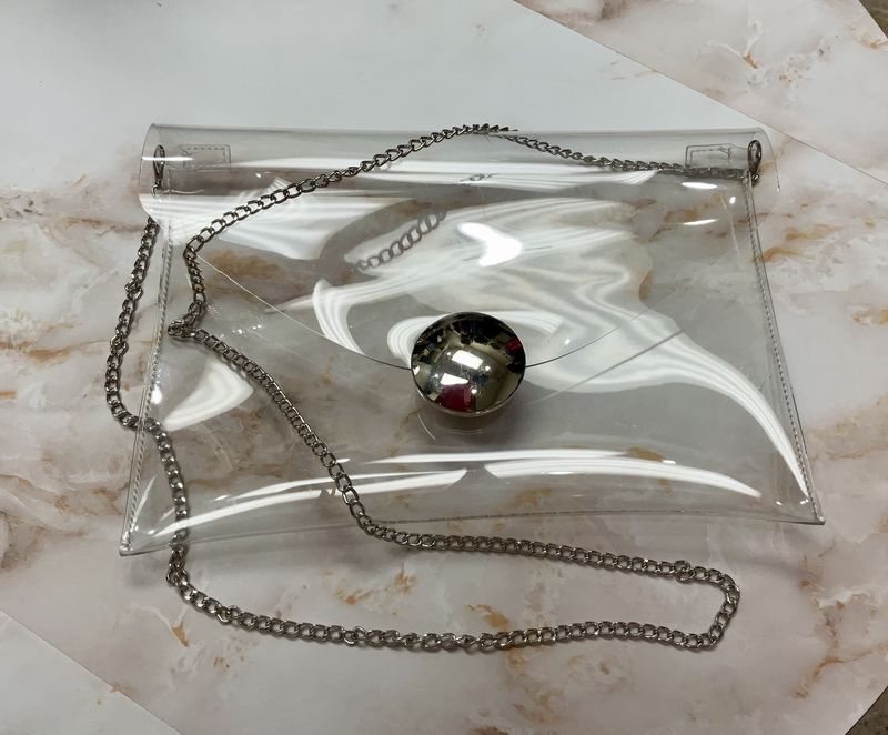 Clear bag with  metal straps