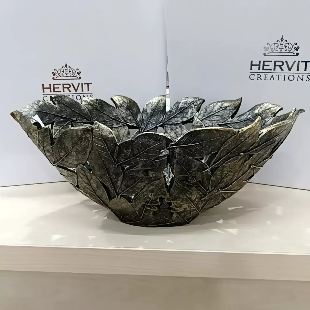 CENTROTAVOLA RESINA FOGLIE 24X39XH17CM LUI/LEI