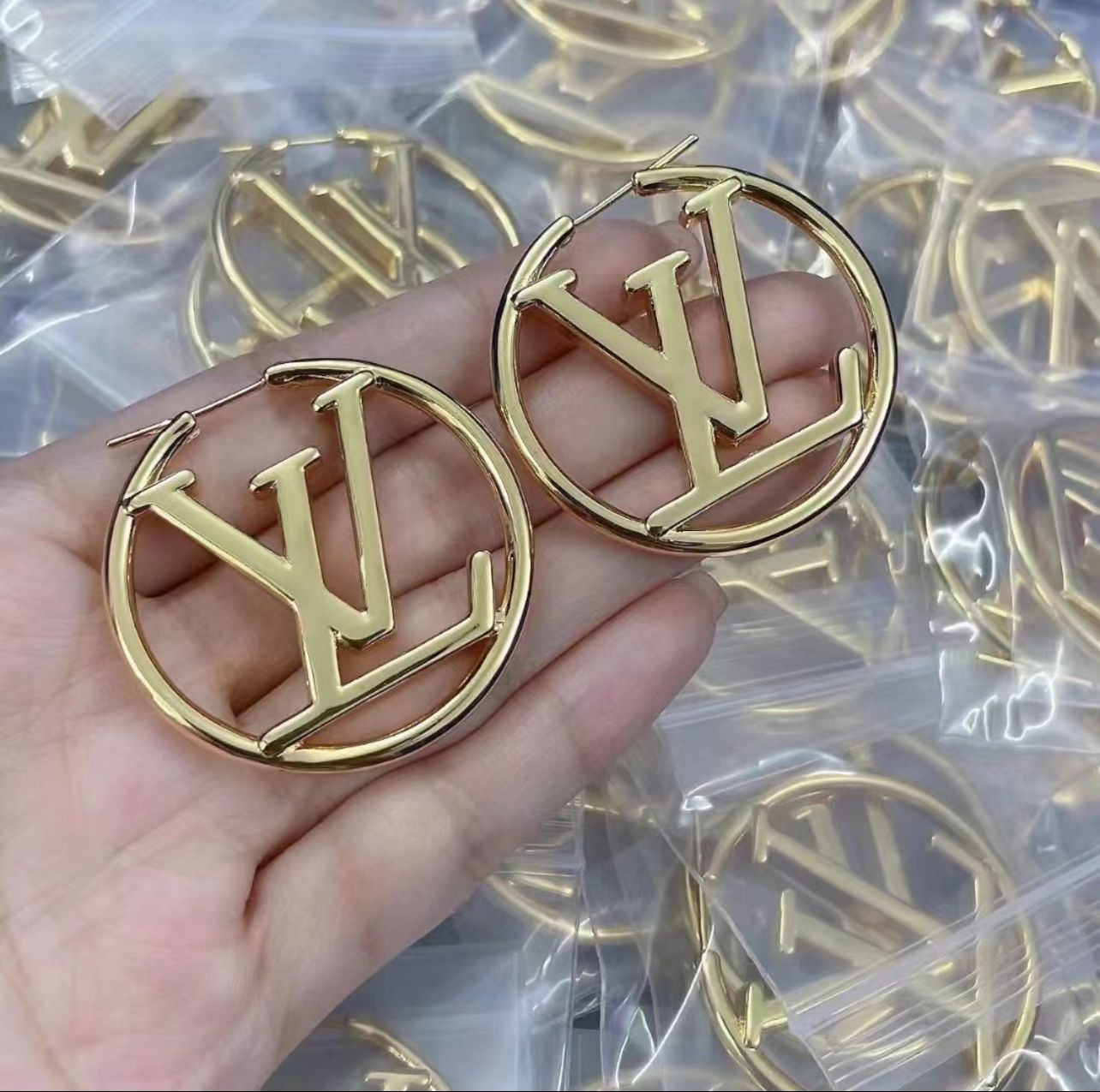 L gold hoop earrings