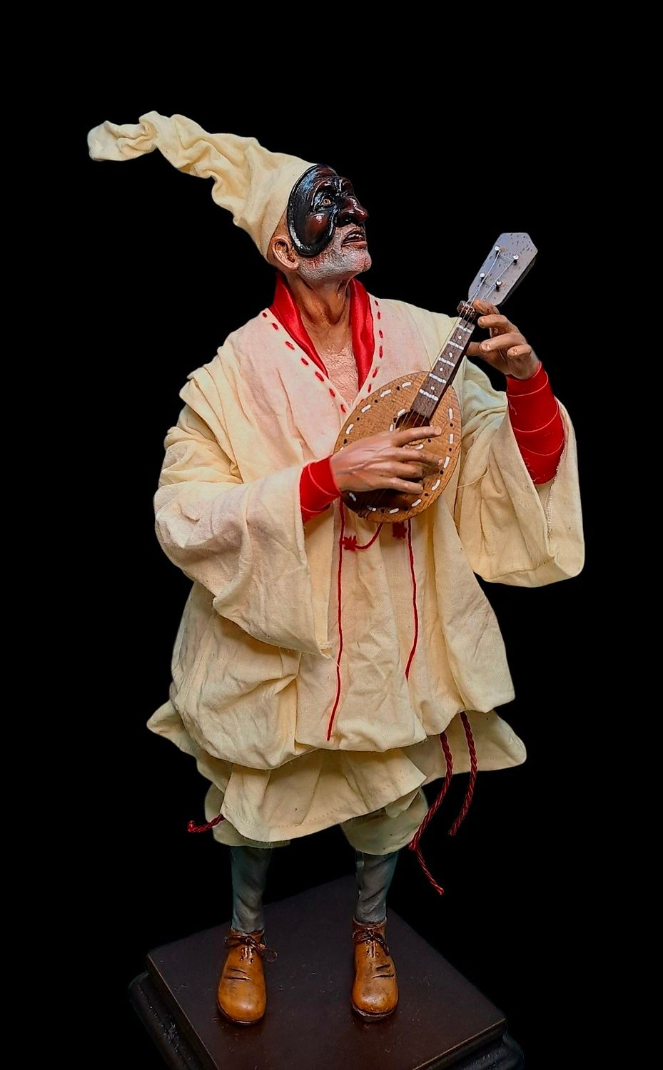 Terracotta Pulcinella with mandolin, size 32 cm