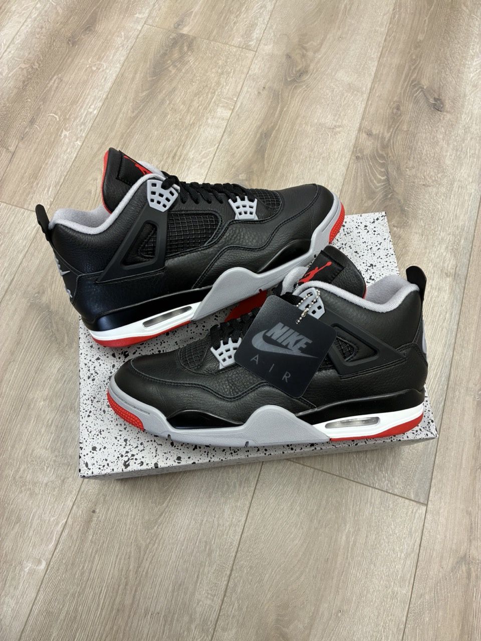 Jordan 4 Retro Bred Reimagined • Pre-Owned