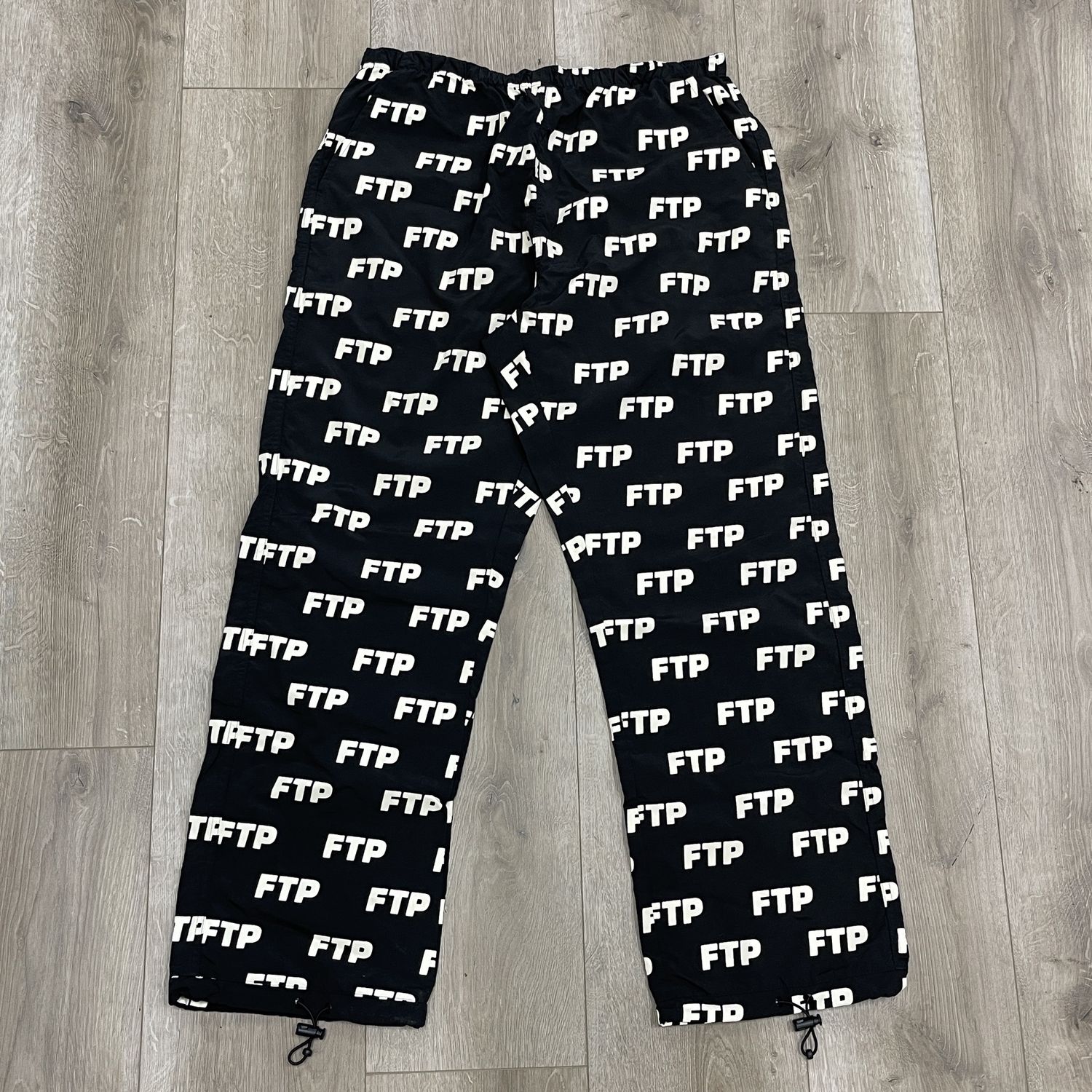 FTP All Over Print Jogger Pants Black - Pre Owned, Clothing Size: L, Product Condition: Pre-Owned