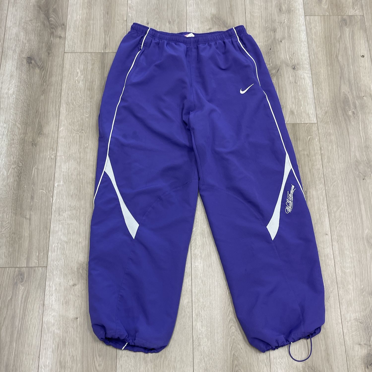 Supreme Nike Track Pant (SS25) Purple - Pre-Owned, Clothing Size: L, Product Condition: Pre-Owned