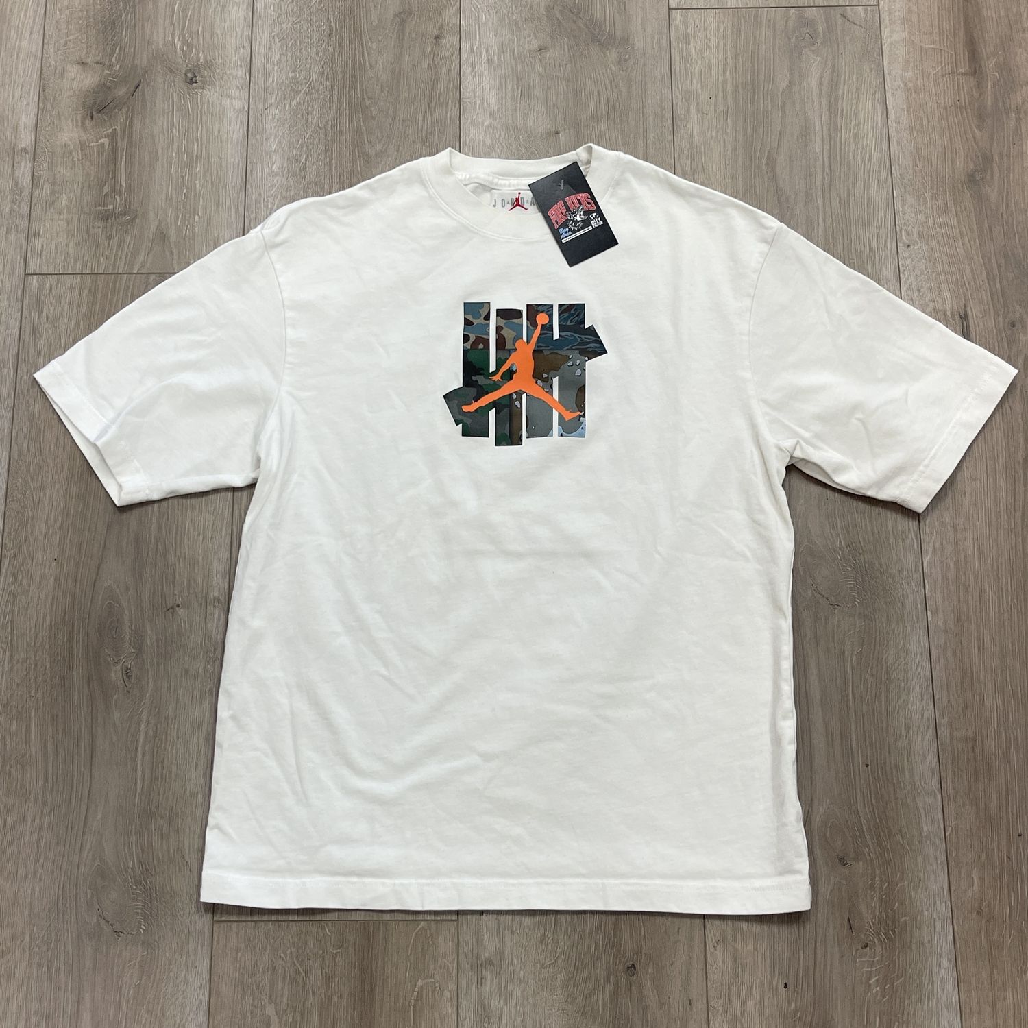 Air Jordan x UNDEFEATED Strikes T-Shirt &#39;White&#39; - Pre-Owned, Clothing Size: M, Product Condition: Pre-Owned