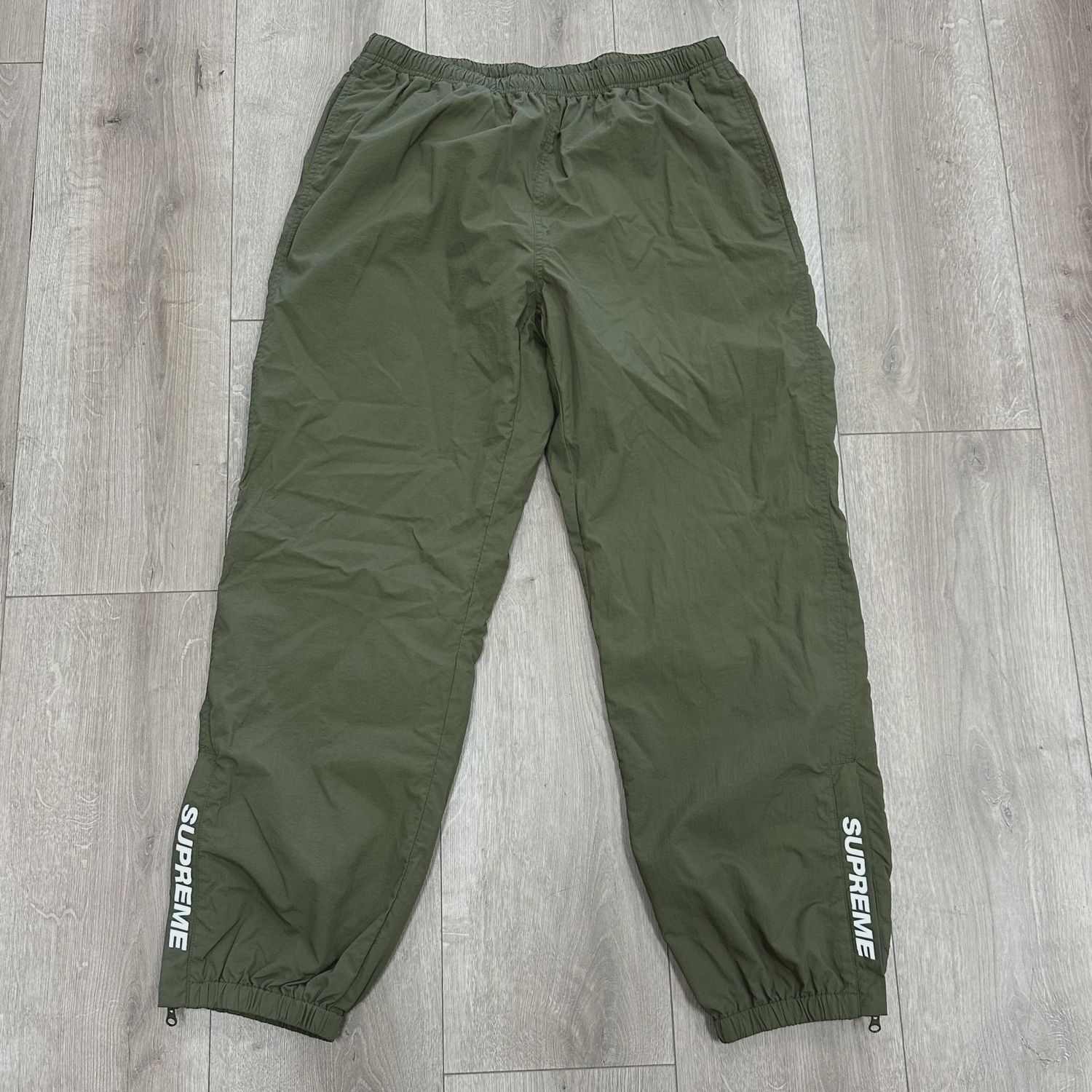 supreme windbreaker pants olive • Pre-Owned [1937]