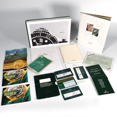 Selection of watch documents mainly Rolex including catalogue manuals warranty cards and chronometer certificate 