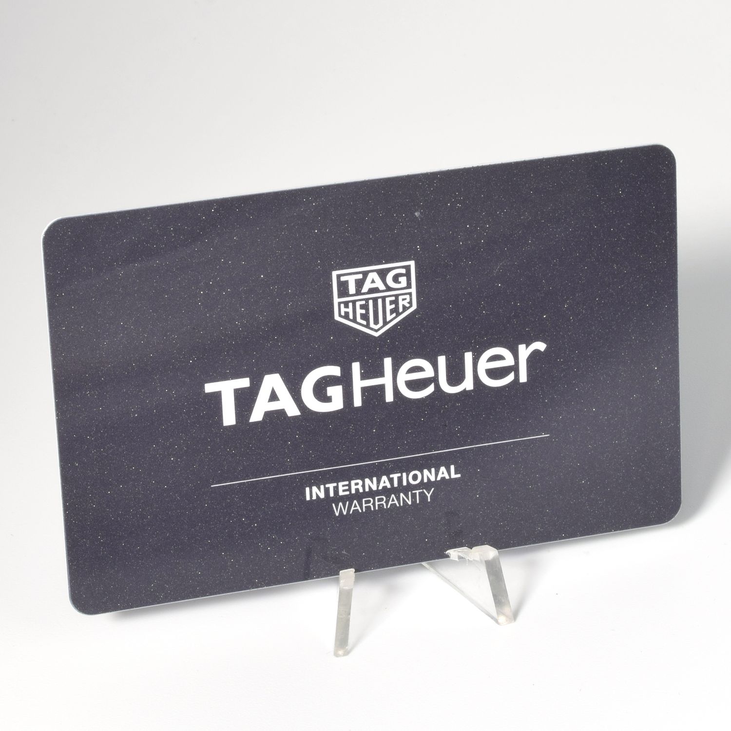TAG Heuer Aquaracer Ladies WAP1450.BD0837 international warranty card on display stand