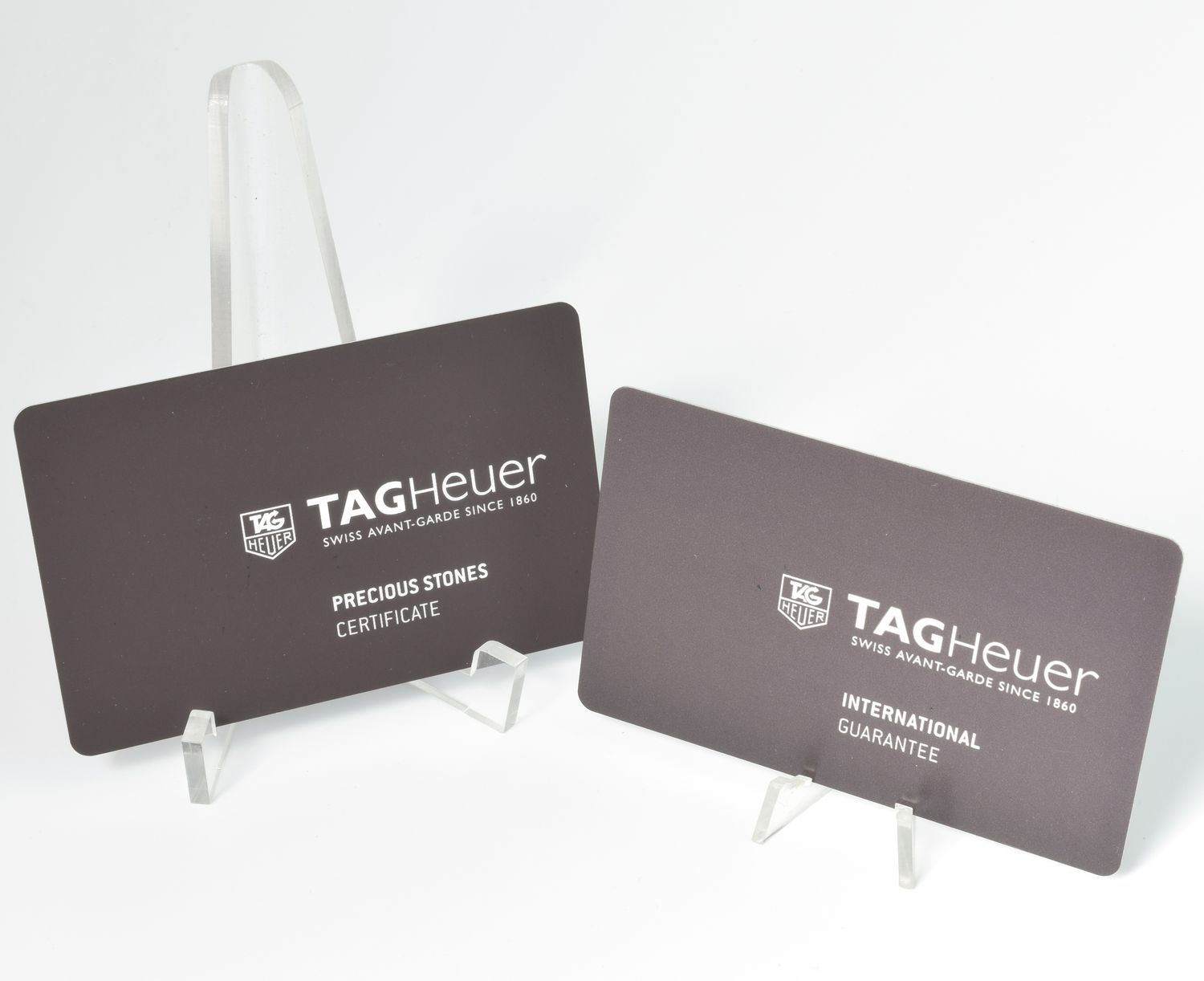 TAG Heuer Formula 1 Ladies WAH1313.BA0868 international guarantee card and precious stones certificate on display stands