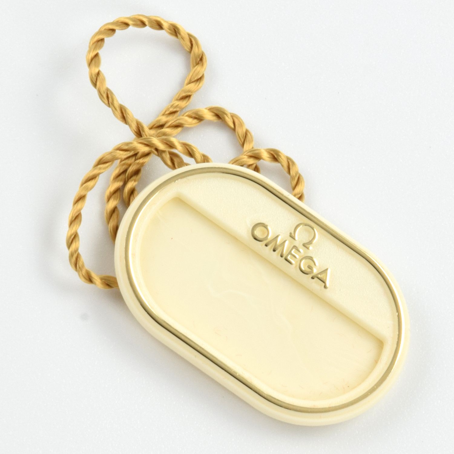 Omega De Ville Prestige 27mm ladies cream hang tag with gold trim and string for 4580.51.00 watch