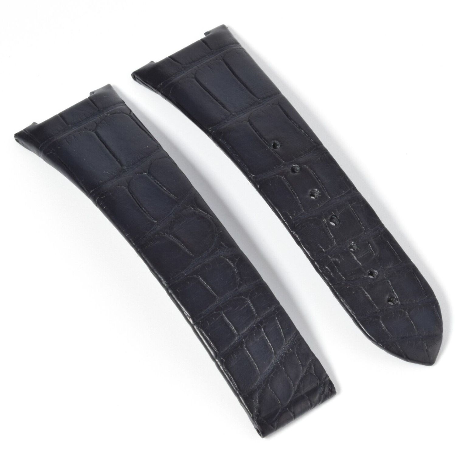 Authentic Omega Constellation black alligator watch strap, 24mm to 18mm taper, model CUZ011345, with visible textured scales and pre-punched holes