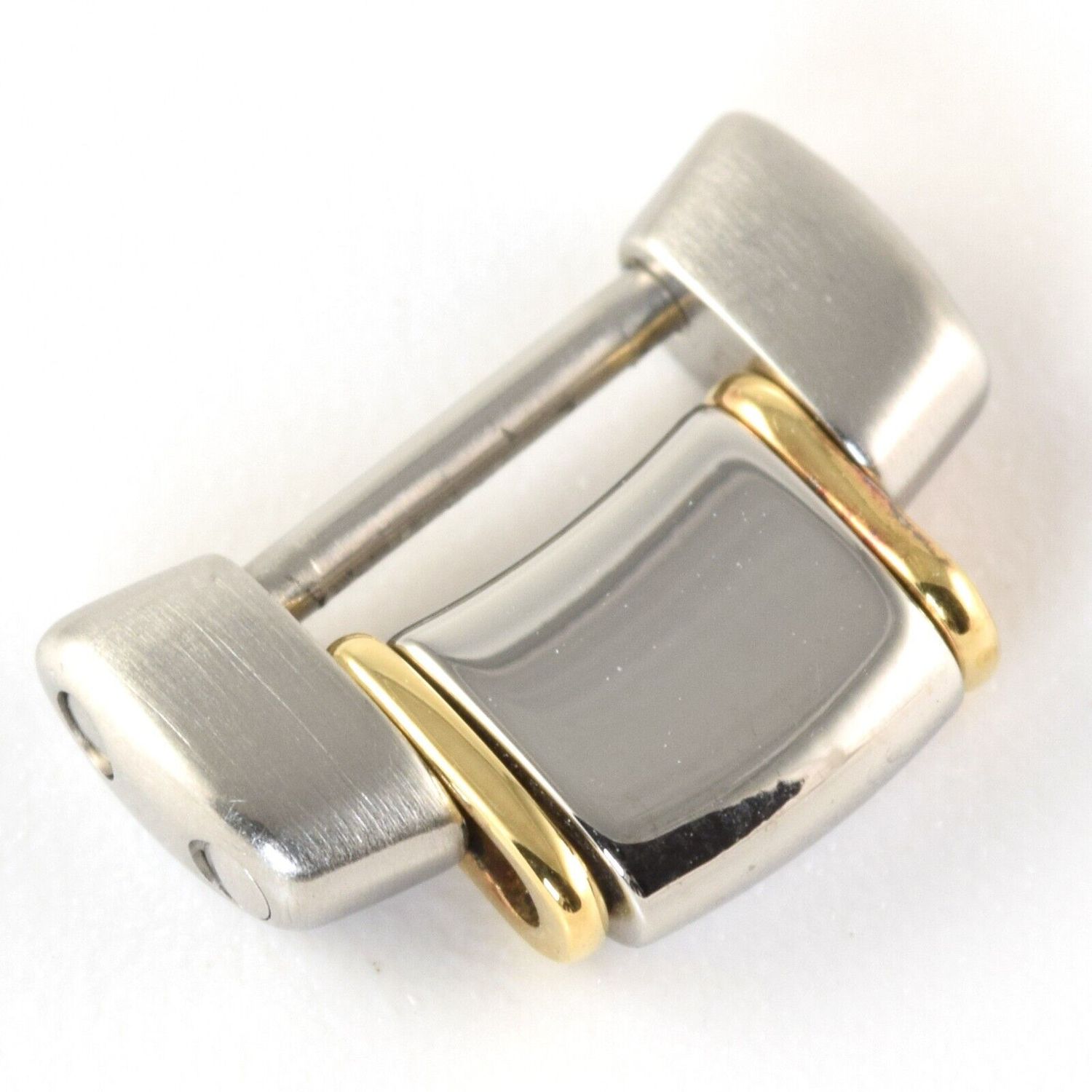 Close-up of a polished and brushed steel EBEL watch bracelet link with gold-tone accents, featuring a connecting bar