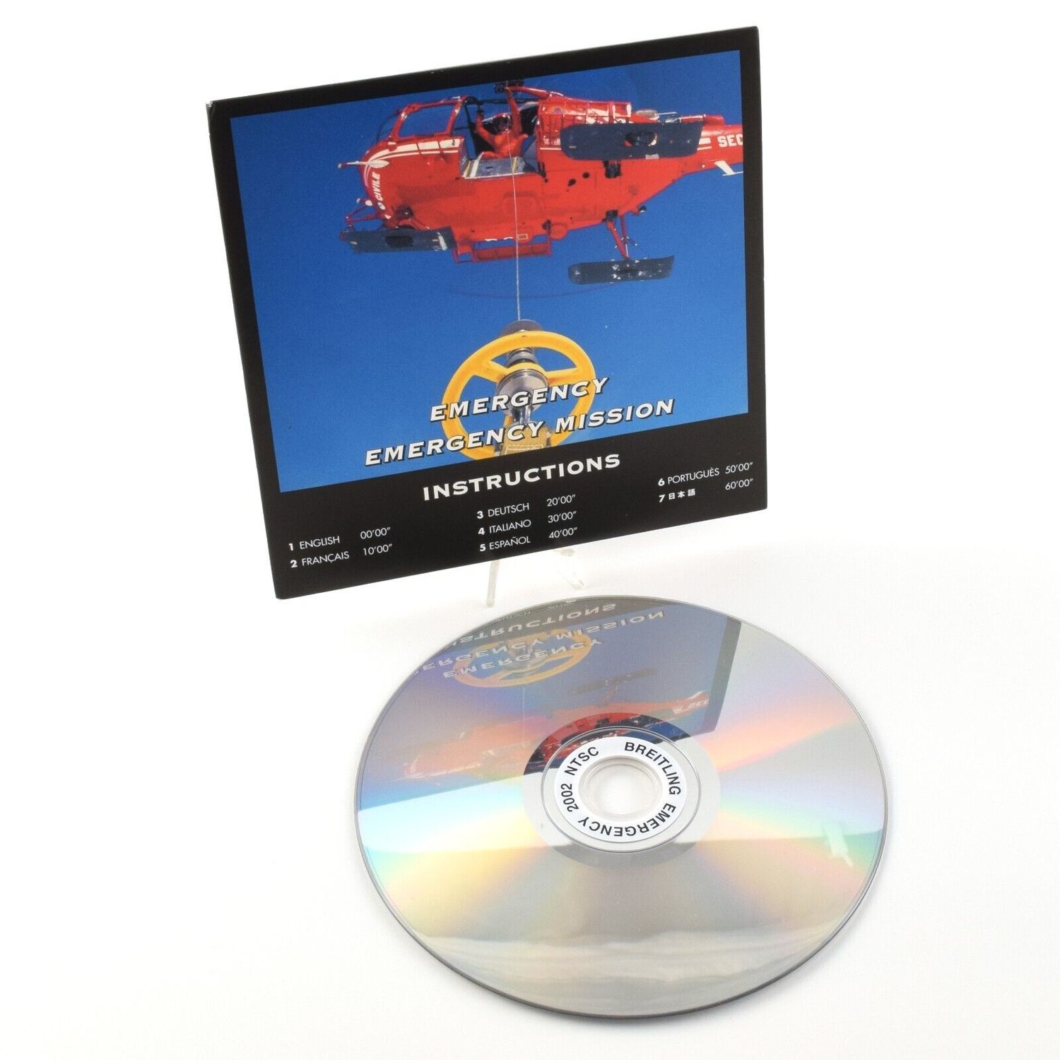 Authentic Breitling Emergency Mission instruction DVD with multilingual guide card featuring a rescue helicopter image