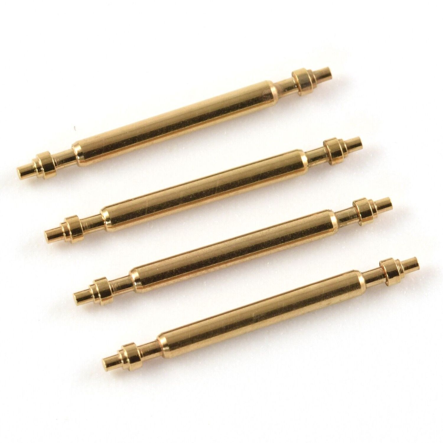 Set of 4 authentic Cartier gold plated single flanged watch spring bars measuring 1.5mm in diameter and 17mm in length displayed on a white background