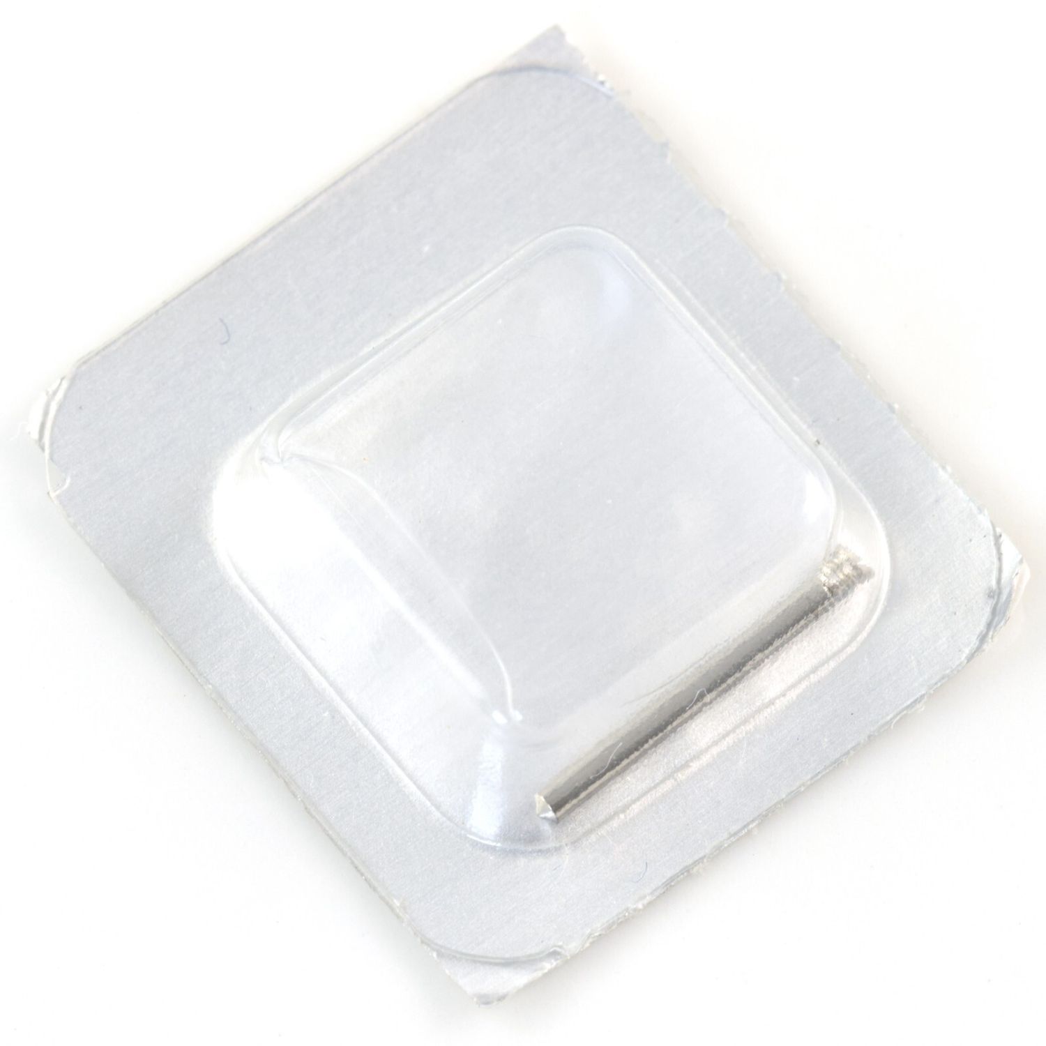 Genuine Cartier steel strap screw for Tank Francaise ladies models sealed in original clear blister packaging with screw visible through the transparent cover