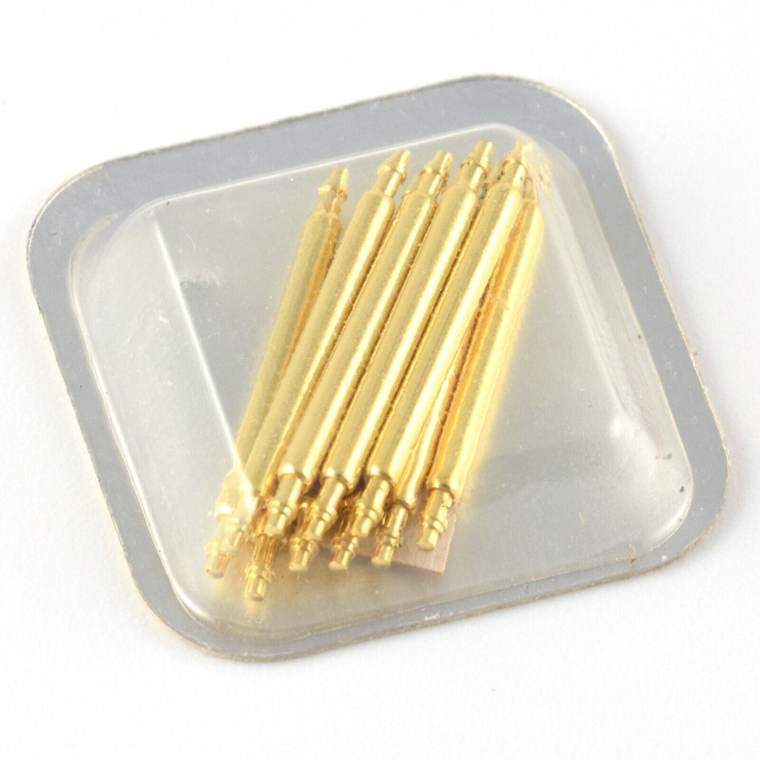sealed blister pack containing 10 gold-plated spring bars for Cartier Tank Must ladies watch arranged in a fan shape under clear plastic