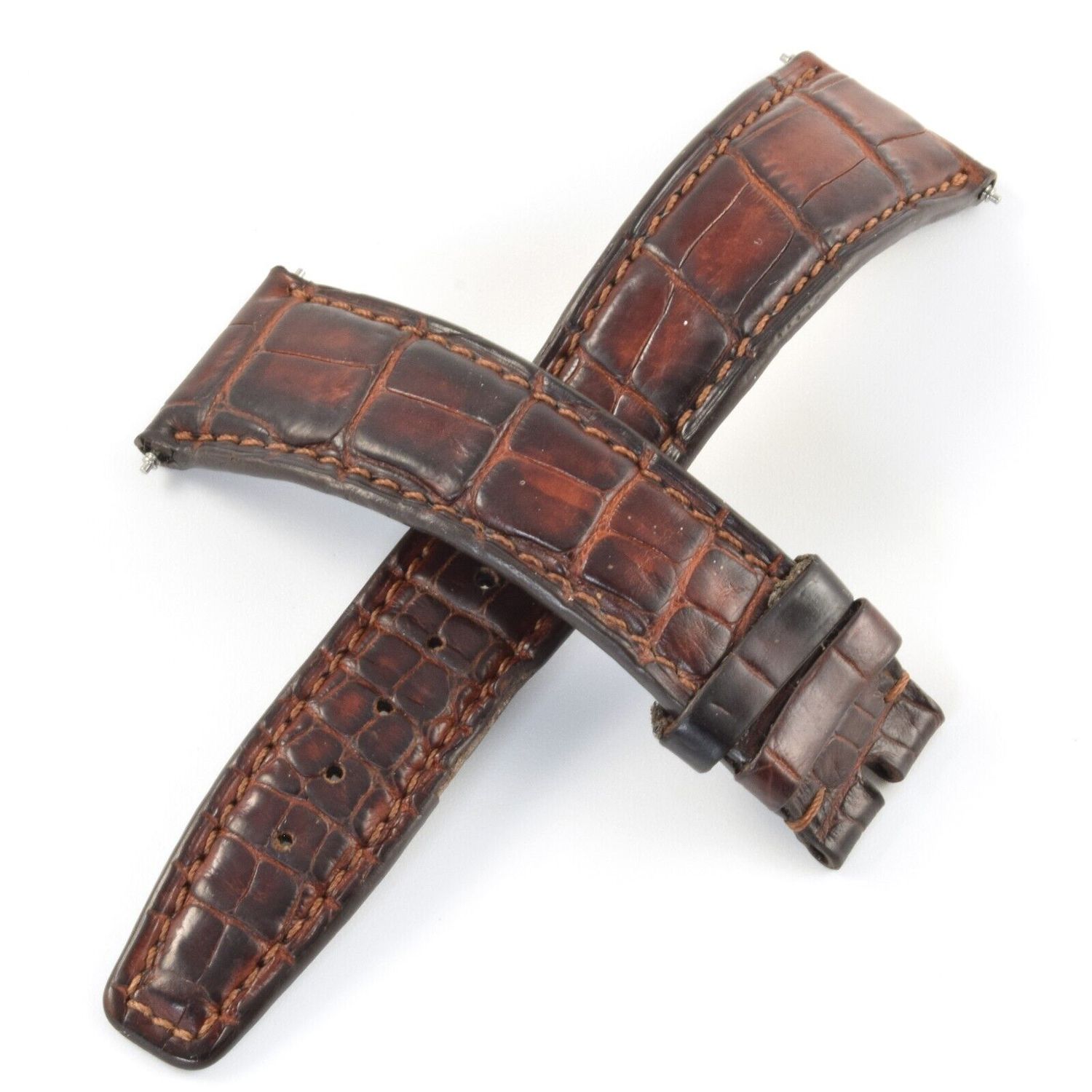 genuine brown alligator IWC watch strap removed from Portuguese Chronograph with 20mm at the watch end and 16mm at the clasp shown with both pieces crossed