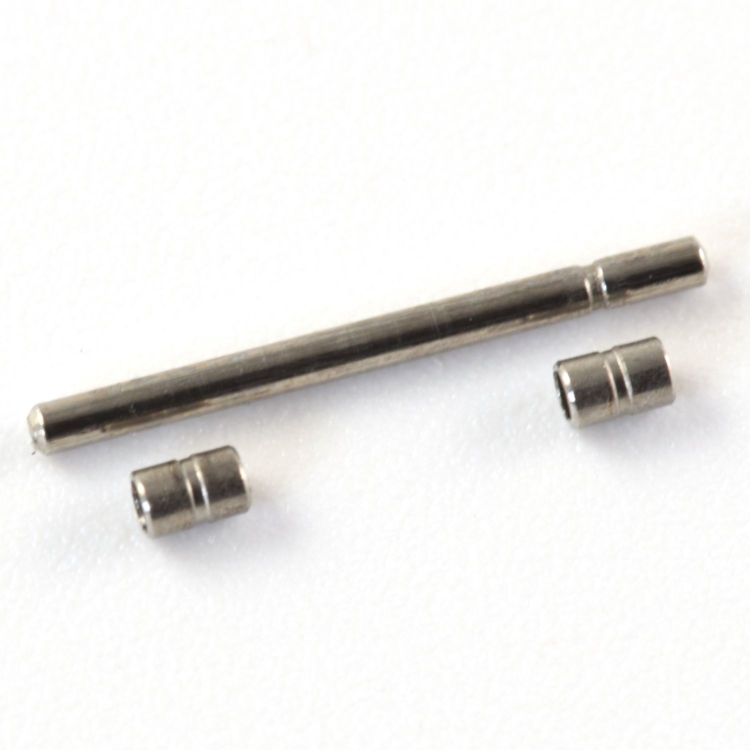 new stainless steel pin and two tubes made to fit some Omega ladies De Ville Prestige watches with 13mm links shown on white background
