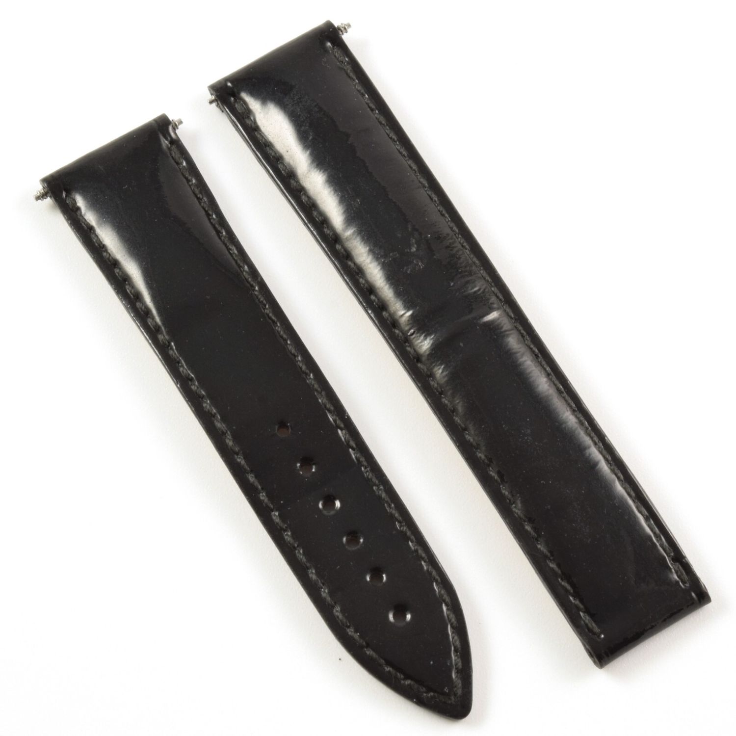 Authentic Omega 98000048 gloss black calf leather watch strap with visible stitching and buckle holes, shown with spring bars attached