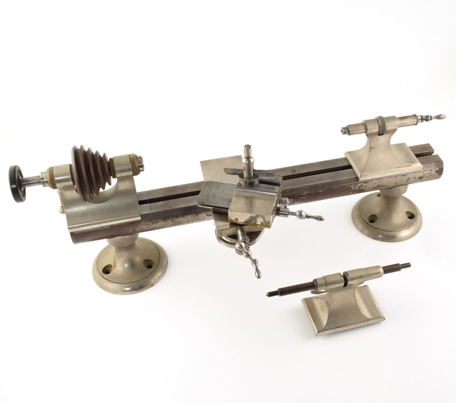 Vintage American Watch Tool Co WW watchmakers lathe with metal base, compound slide, indexable headstock, tailstocks, and belt pulley as shown in full layout from above