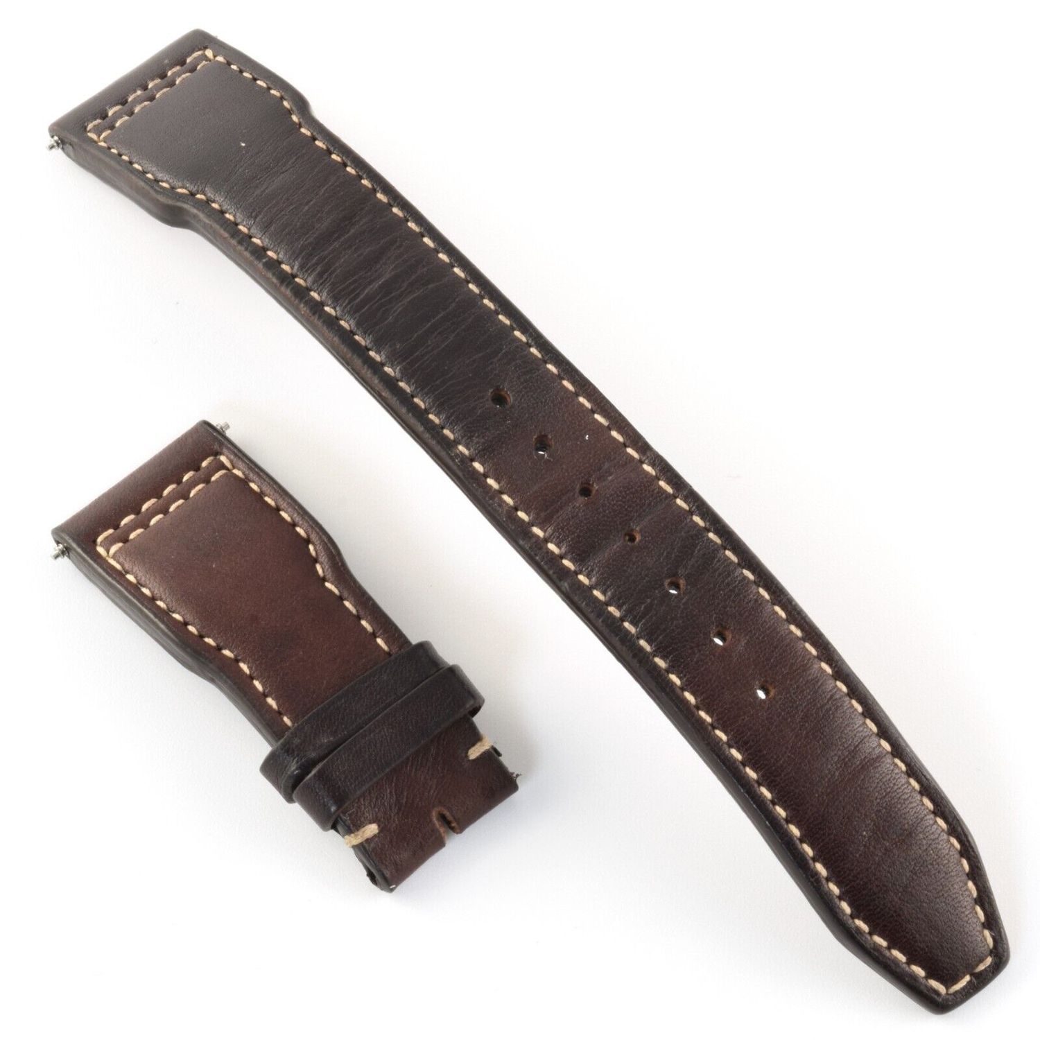 Authentic IWC Big Pilot 43mm dark brown calf leather watch strap with contrast stitching, shown with one long strap and one shorter strap piece, batch number A59236 visible