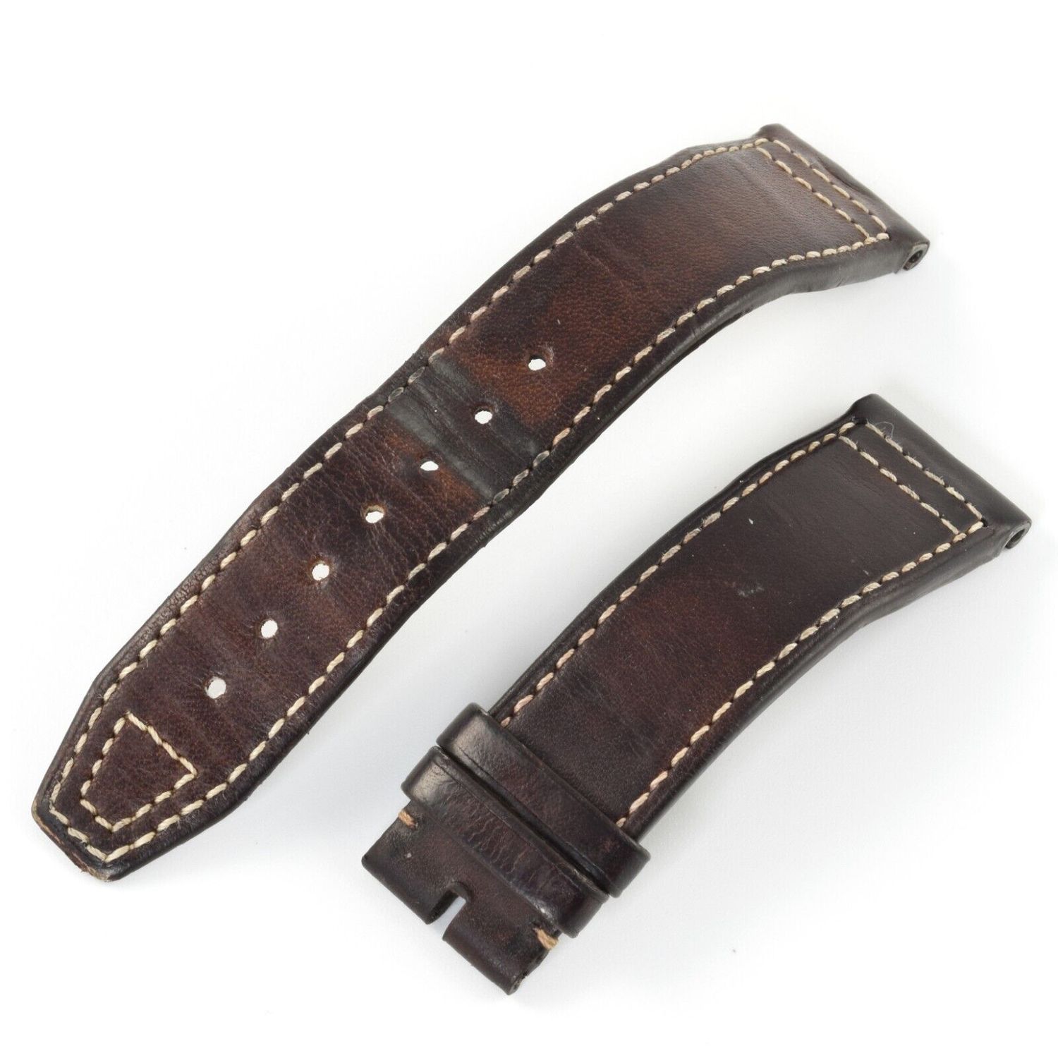 IWC brown leather watch strap with cream stitching and EasX-CHANGE quick release showing lug wear on white background