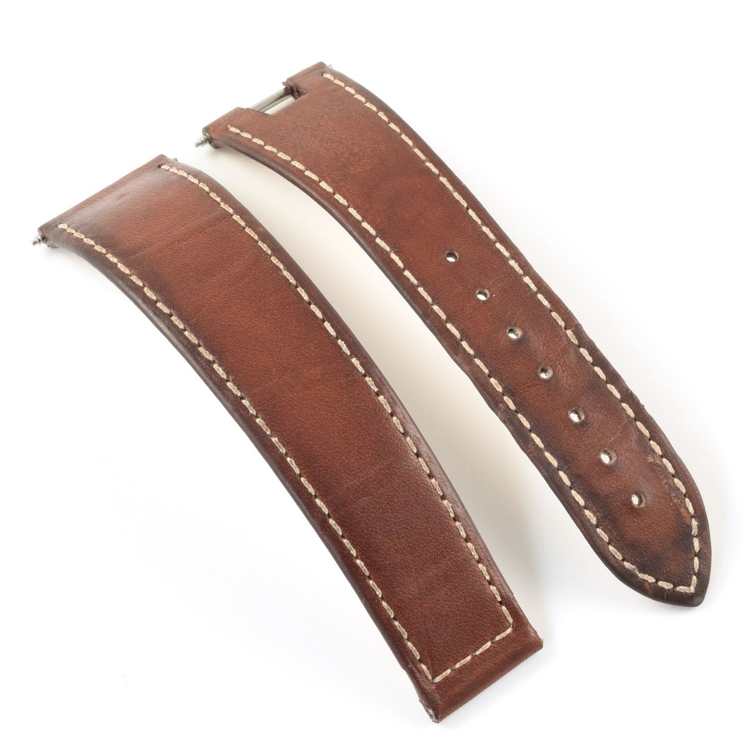 Omega Seamaster Bullhead brown calf leather watch strap with white stitching, visible spring bars, and hole spacing on top