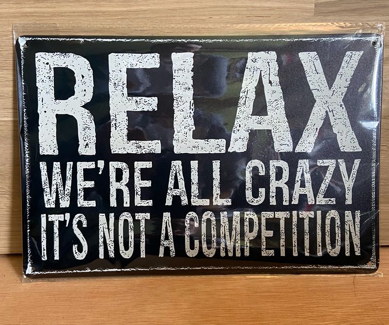 Metal Sign - Relax, We’re All Crazy