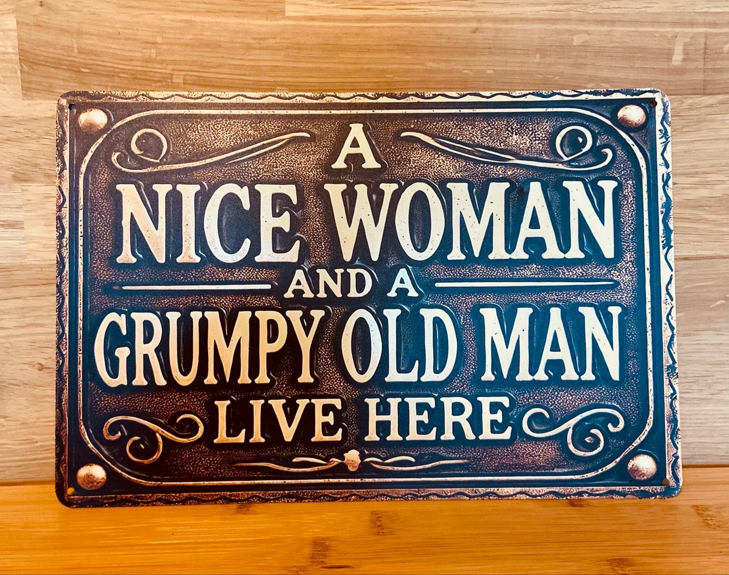 Metal Sign - A Nice Woman And A Grumpy Old Man Live Here