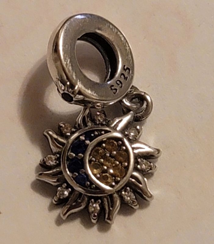 Sun and moon charm