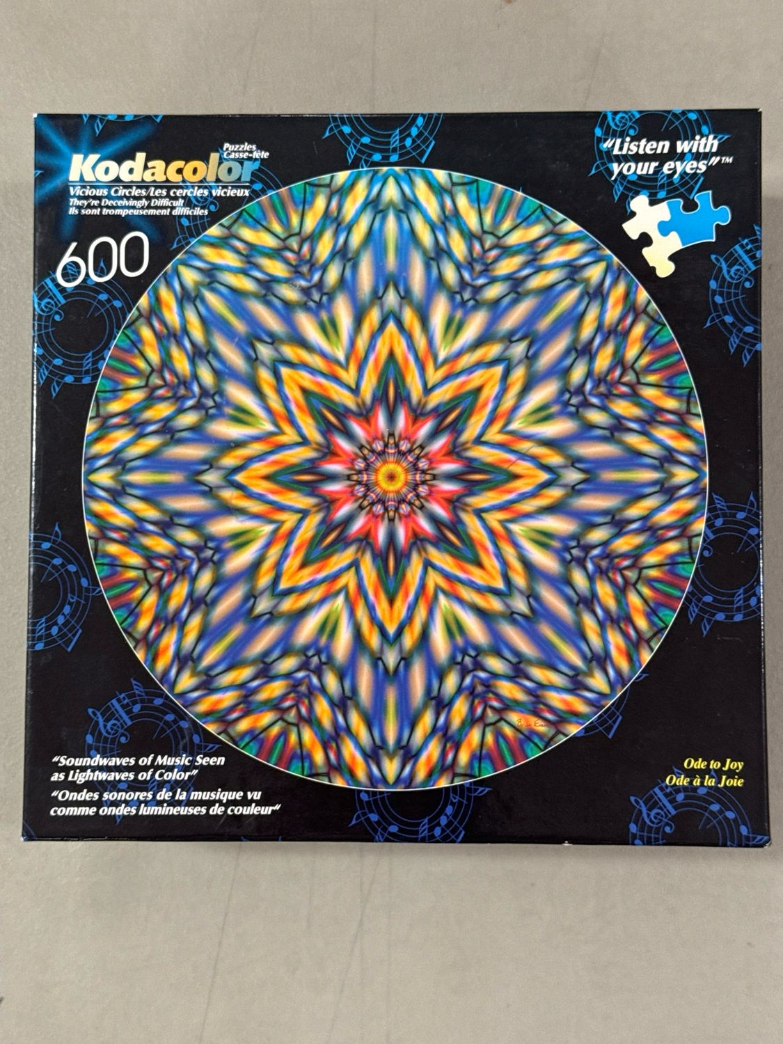 Puzzle - Vicious Circles. Kodacolor. 600 pieces. Circular. (Sealed puzzle)