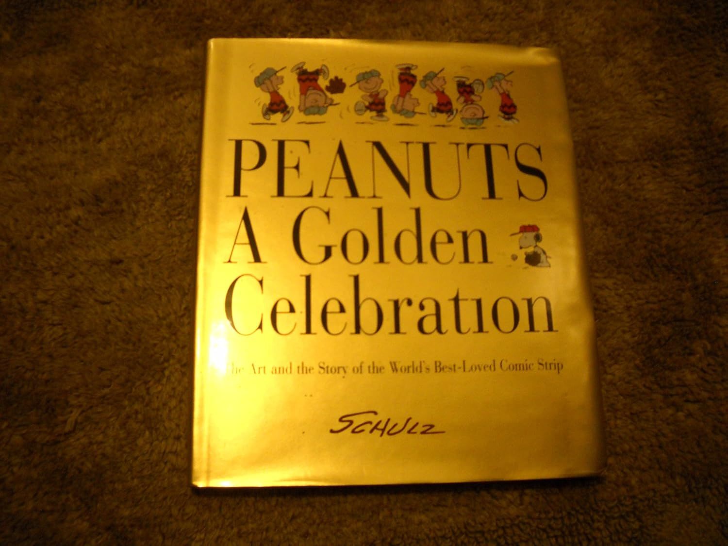 Peanuts: A Golden Celebration: The Art and the Story of the World's Best-Loved Comic Strip. (REALLY BIG Book)