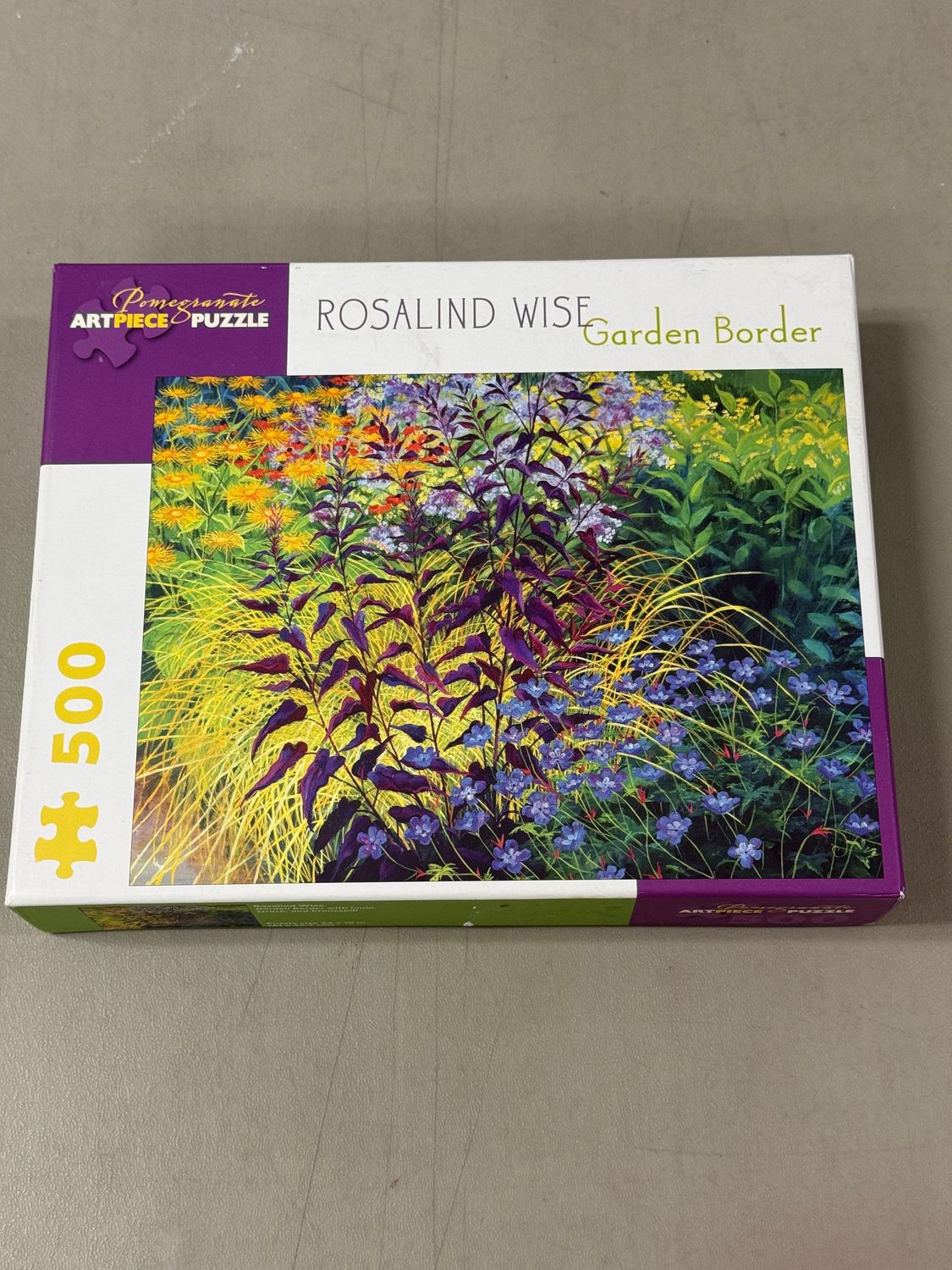 Puzzle - Garden Border by Rosalind Wise. Pomegranate Artpiece. 500 pieces.