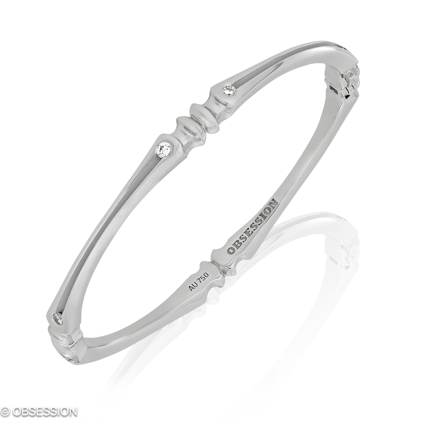 Gremlin Armreif in Weissgold, mit einer Breite von mm, geeignet für einen Armumfang von 165mm.