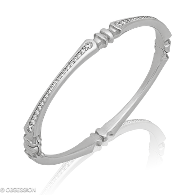 Gremlin Armreif in Weissgold, mit einer Breite von mm, geeignet für einen Armumfang von 165mm.