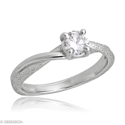 Solitärring Unendliche Geschichte in Weissgold und einem Brillant vs1