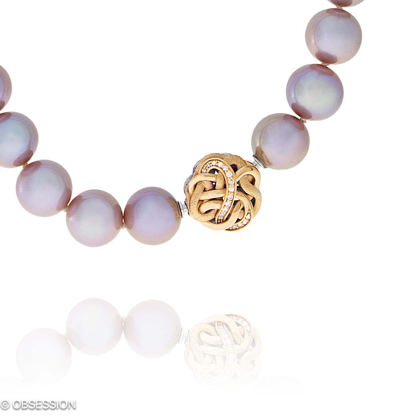 Unendliche Geschichte Perlcollier in Rotgold, mit einer Länge von 400mm.