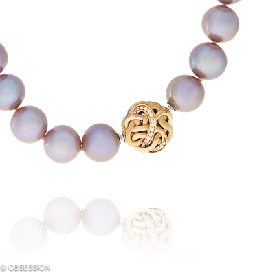 Unendliche Geschichte Perlcollier in Rotgold, mit einer Länge von 400mm.