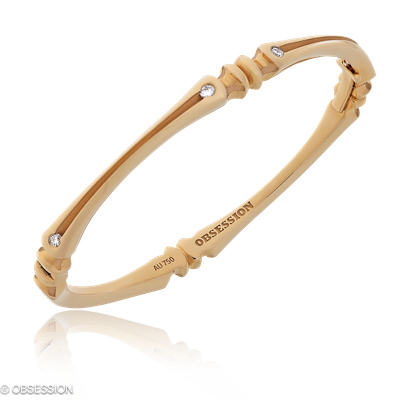 Gremlin Armreif in Rotgold, mit einer Breite von mm, geeignet für einen Armumfang von 165mm.