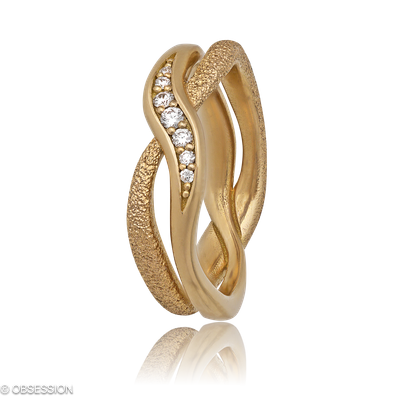 Unendliche Geschichte Partnerring in Rotgold, mit einer Ringbreite von 5.5mm und einer Ringgrösse v…