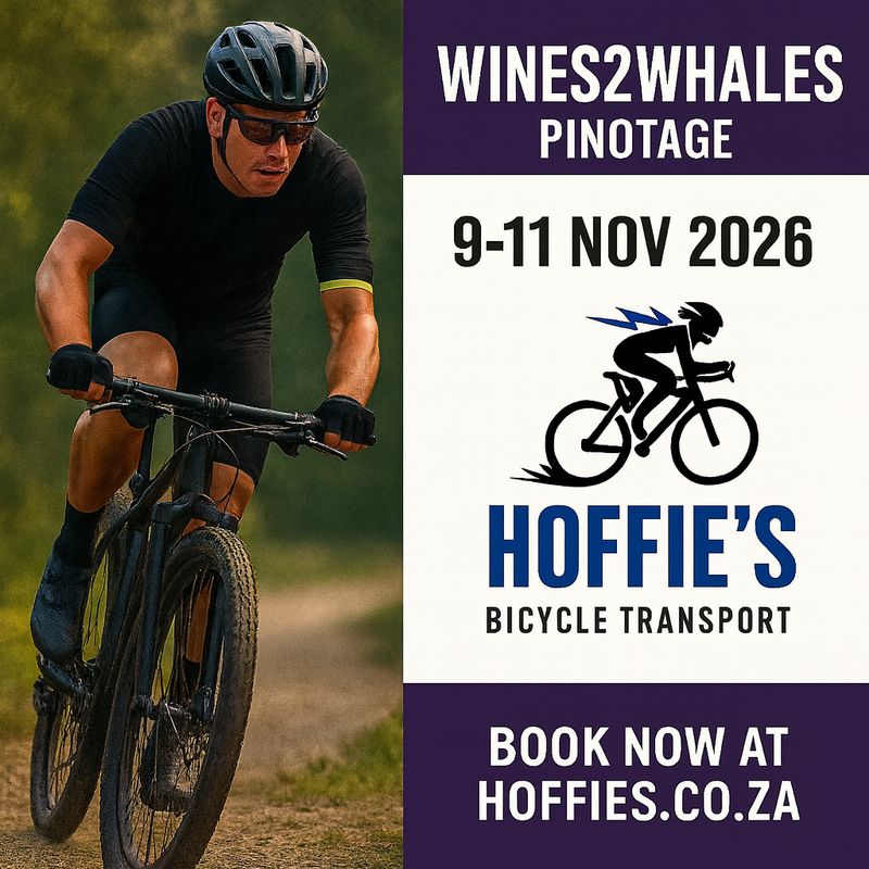 Mountain biker on trail promoting Wines2Whales Pinotage 2026 with Hoffie’s Bicycle Transport service details and event dates.