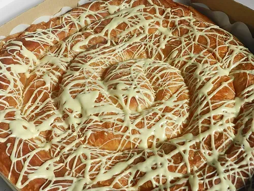 Ensaimada de chocolate blanco