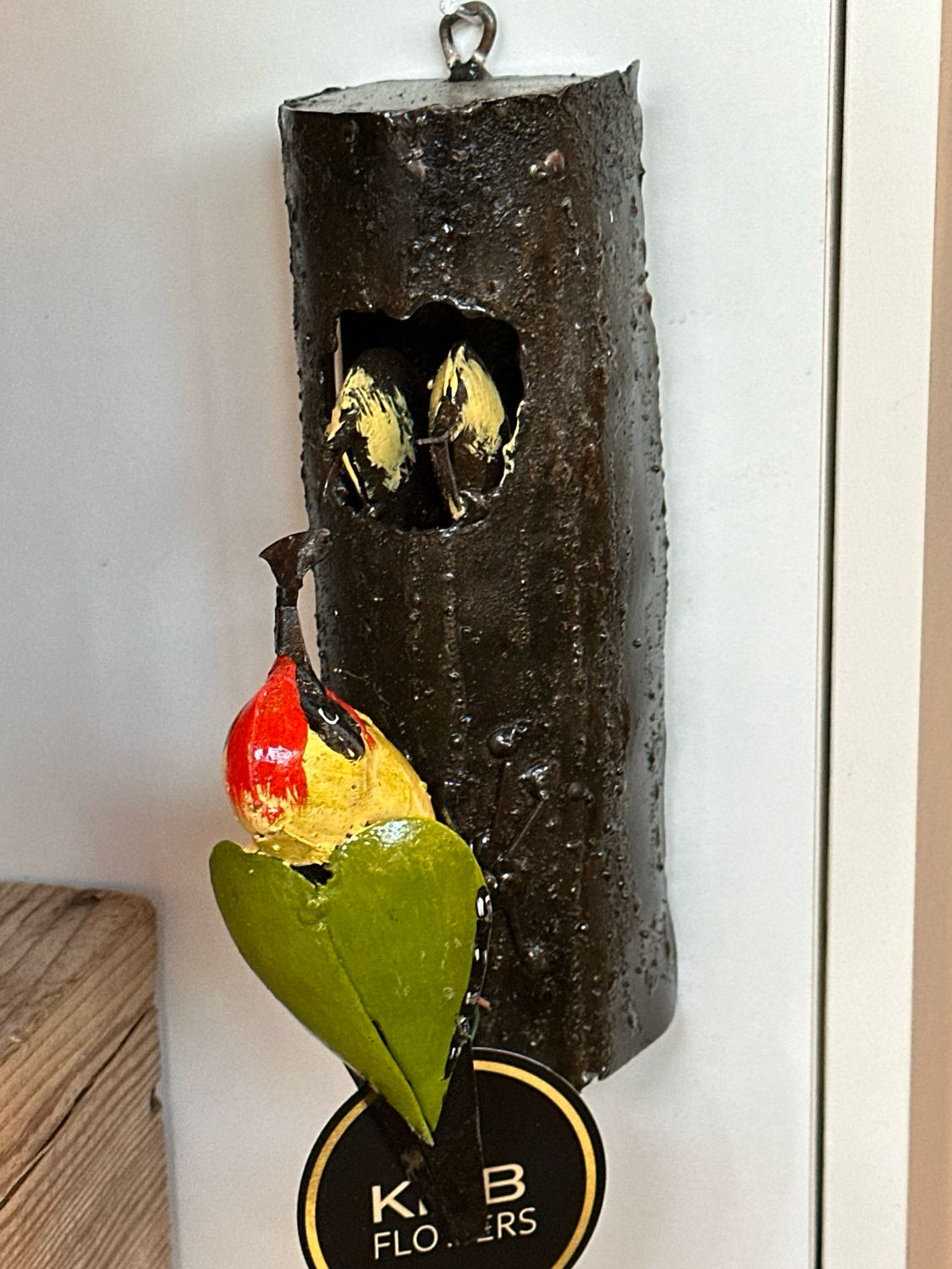 Metalen groene specht met jongen
