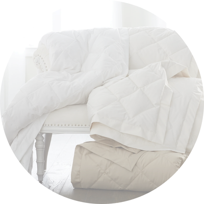 COMFORTERS + PILLOWS