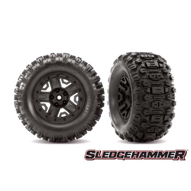 TRX-6792 Traxxas Tires &amp; wheels, assembled, glued (black 2.8 wheels, Sledgehammer tires, foam inserts) (2) (TSM rated)