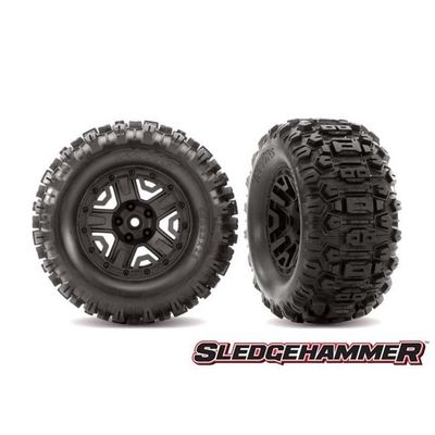TRX-6792 Traxxas Tires &amp; wheels, assembled, glued (black 2.8 wheels, Sledgehammer tires, foam inserts) (2) (TSM rated)