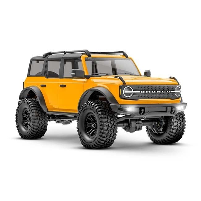 TRX-97074-1-ORNG Traxxas TRX-4m Crawler with Ford® Bronco® (Cyber Orange): 1/18 Scale 4WD Electric Truck w/ TQ™ 2.4GHz Radio, ECM-2.5 Electronic Control Module (fwd/rev), and Titan® 87T motor. Include