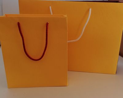 Papiertragetasche 20 + 9 x 23 + 4 cm in Leder gelb