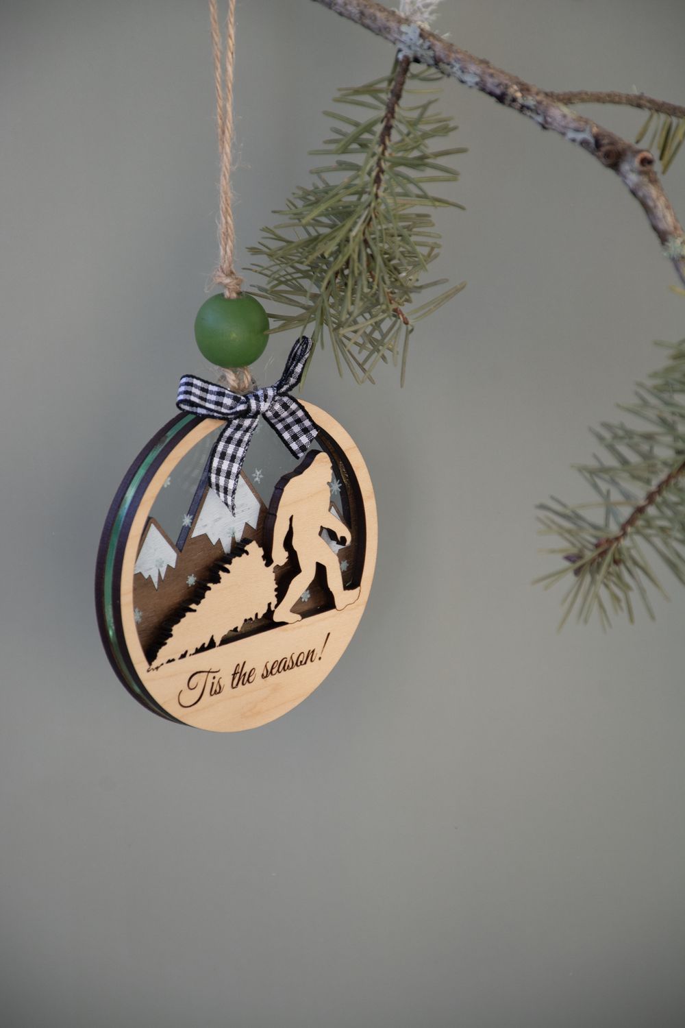 Bigfoot Carrying Tree Ornament
